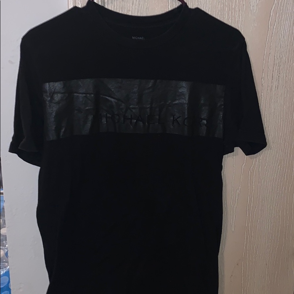 Michael Kohl’s T shirt